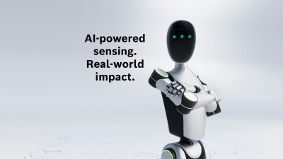 A robot with its arms crossed, looking this way